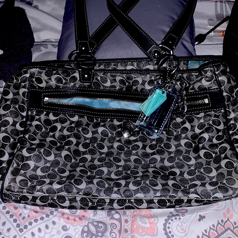 Authentic black blue and grey coach purse in good condition.